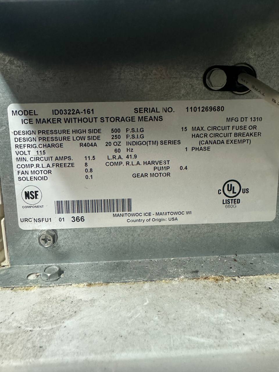 The Manitowoc nameplate: Indigo ice maker Model ID0322A-161, R404A refrigerant, 115V, made in the USA.