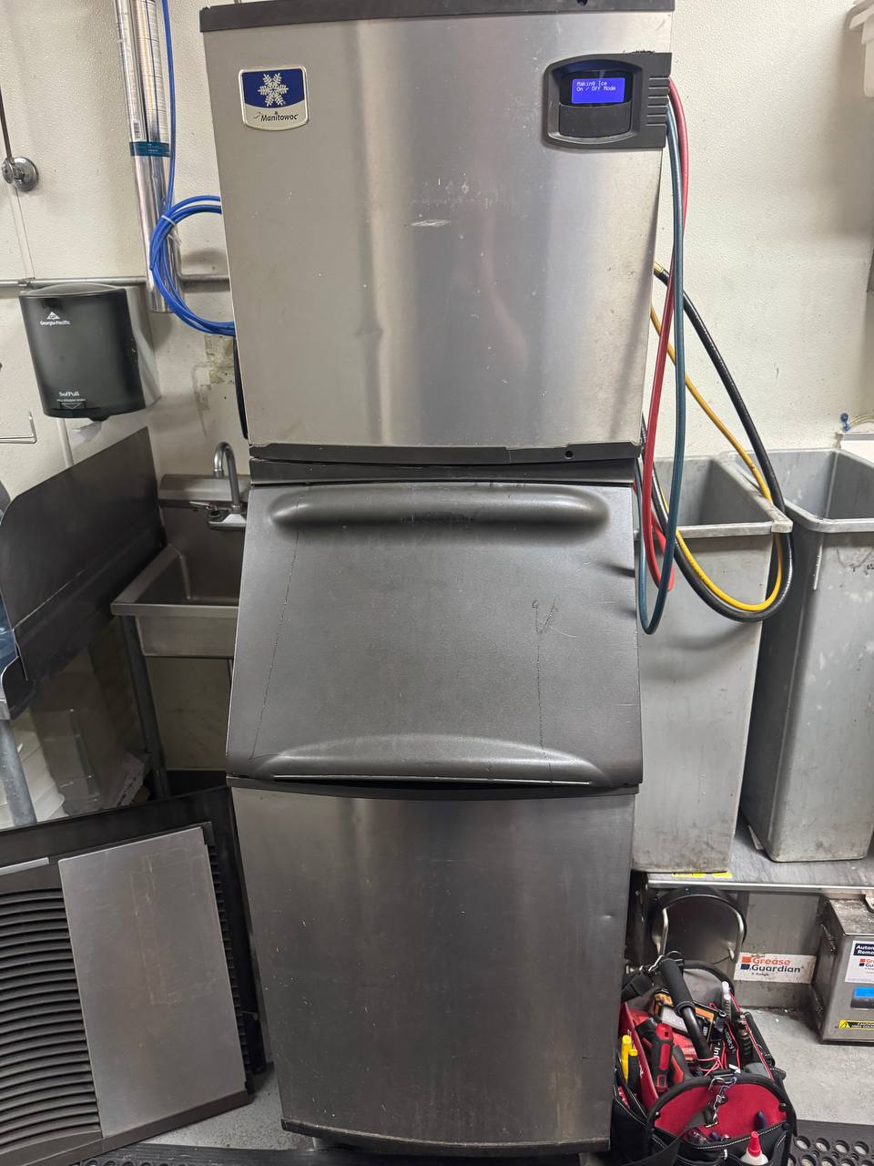 Manitowoc Indigo commercial ice machine on its storage bin in a Union City kitchen during a poor-ice-quality diagnostic.